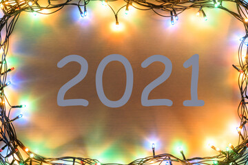 Wall Mural - Summing up the results of 2021. A muddy Christmas frame surrounded by a garland.