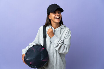 Wall Mural - Young sport woman with sport bag celebrating a victory