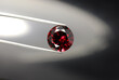 Round faceted, custom cut Natural rhodolite garnet gemstone setting. Perfect sheped, clean, colorful deep cherry red color semiprecious stone. Shimmer in crystal massif. Sparkling, shiny, rich colour.