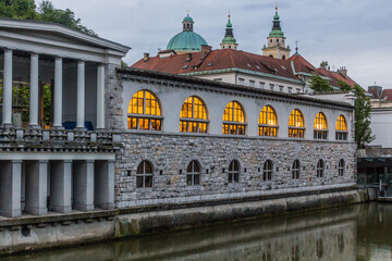 Wall Mural - Plecnik arcade market building and Ljubljanica river in Ljubljana, Slovenia