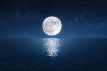 Full moon over the peaceful sea (Elements of the moon image furnished by NASA)