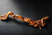 Graceful Curved Wood Driftwood On A Black Background