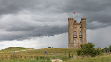 Stone Castle Tower Against A Grey Stormy Sky