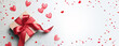 Top view photo of valentine's day decorations white gift box with red ribbon bow and small hearts on isolated light background.