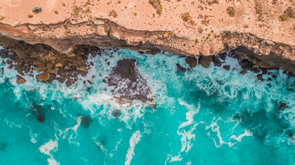 Wall Mural - Drone shot of an SUV Eucla/Nullarbor National Park Great Australian Bight Coastline South Australia