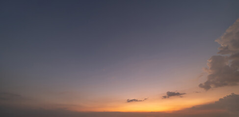 Wall Mural - Sunset sky. Abstract nature background. Dramatic blue with orange colorful clouds in twilight time.