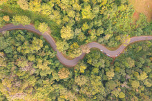Aerial View Of Cars Driving On Curved, Zigzag Curve Road Or Street On Mountain Hill With Green Natural Forest Trees In Rural Area Of Nan, Thailand. Transportation.
