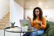 © Prostock-studio - Black woman having videochat using laptop and talking