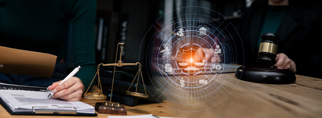 Concepts of Law and Legal services. Lawyer working with law interface icons. Blurred background.	