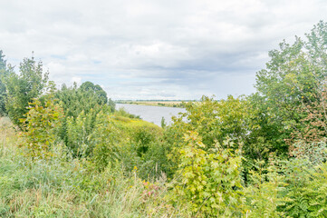 Poster - Landscape view with Vistula river in background at cloudy day.