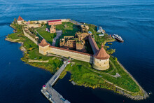 Aerial Photography Of The Oreshek Fortress In Shlisselburg In Summer In Lake Ladoga. Top View Of Walnut Island With A Fortress. Russia, Shlisselburg, 08.21.2021