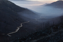 Mountian Landscape On A Calm Foggy Morning After A Wildfire 