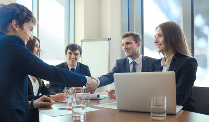 Business people shaking hands, finishing up a meeting