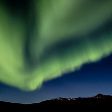 Norwegian Aurora Borealis - Northern Lights On The North Pole With Mountain Peaks