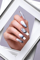 Canvas Print - Creative gradient design of nails on female hands. Art manicure.