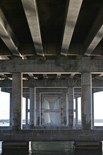 Detail Of Underside Of Rickenbacker Causeway Bridge In Miami, Florida On Calm Sunny Winter Morning.