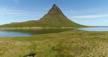 Wall Mural - iceland nature drone video of kirkjufell mountain landscape. icon of iceland and most photographed m
