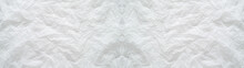 白いティッシュペーパーの皺のテクスチャー。薄い紙の横に長いパノラマの背景素材。