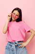 © Tatiana - optimistic young woman in a pink t-shirt casual clothes Lifestyle unaltered