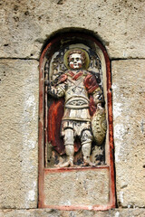 Wall Mural - Old stone statue on abandoned Georgian monastery