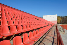 Red Benches In The Stadium