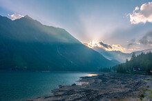 Sunset Over The Ceresole Lake In The Italian Alps