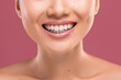 © Prostock-studio - Female smile. Unrecognizable woman smiling, showing perfect white teeth