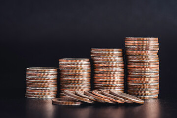 coins stacked on each other in different positions, Growth money of profitability of professional investment planning, Business, and finance concept.