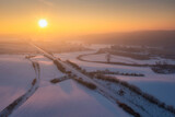 Fototapeta Bambus - Winter scenery of Kociewie fields at sunset. Poland