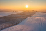 Fototapeta Bambus - Winter scenery of Kociewie fields at sunset. Poland