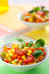 Wall Mural - Healthy vegetarian vegetable salad with corn, tomatoes and cucumber