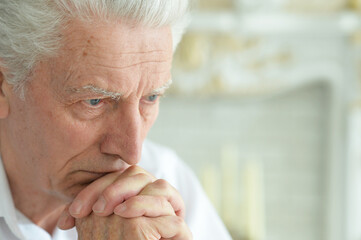 Sticker - portrait of beautiful sad thinking senior man posing