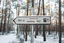 Tourist Sign Of The Interesting Place Of Remains Of The Polish Home Army (abbreviated AK) Trench "Jedliny 102" In The Middle Of The Tuchola Forest.