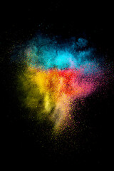 Wall Mural - Explosion of colored, fluid and neoned powder on black studio background with copy space. Magazine cover, wallpaper design