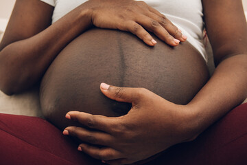 pregnant belly of a black woman