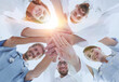 © ASDF - bottom view.a team of doctors at the medical center clasped their hands together