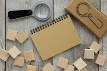 Notepad On Wood Background. Place For Your Text.