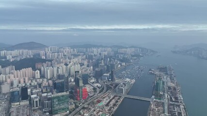 Wall Mural - 4K aerial footage flying over Hong Kong city - Kowloon 
