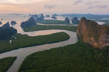 Wall Mural - aerial drone footage flying over mangroves and lush rainforest in phangnga bay thailand the view is 