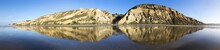 Eroded Sandstone Rock Bluffs Reflected In Shallow Tide Pools At Torrey Pines State Beach. Wide Pacific Coast Panoramic Landscape, North Of San Diego California