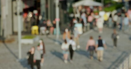 Sticker - Blur view of people walk in the street at sunset time