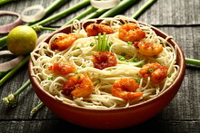 Asian Street Foods- Delicious And Spicy Cooked Seafood Noodles With Shrimps And Prawns. Traditional Non Vegetarian  Recipes.
