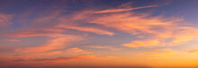 Panorama Of A Colorful Sunset With Orange And Red Clouds As Background Or Texture