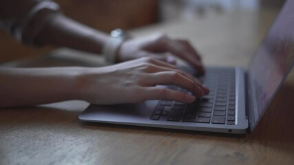 Businesswoman searching the web on her internet -Working from home