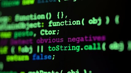 Close up of monitor screen with developing programming and coding technologies. Programmer or hacker is typing code on keyboard. Concept of bitcoin btc mining and development in virtual cyber space