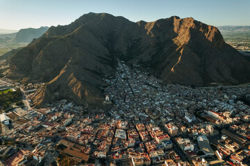 Wall Mural - Aerial view Callosa de Segura townscape located in foothills. Spain