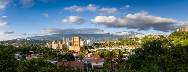 Wall Mural - Panoramic view of Caracas City at sunset from Cota Mil. Venezuela