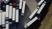 Aerial Shot Of A Large Truck Parking Lot, A Logistics Center For Transporting Goods Across The Country And Abroad
