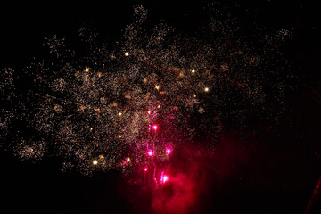 Fireworks sparks on a black sky background. graphic resource for design. Blank for the designer. Underlay or undercoat