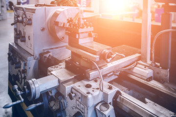 Wall Mural - Lathe in the metalworking workshop, close up